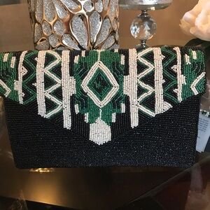 America and Beyond Beautiful Clutch and Crossbody called the “Little Black Bag”
